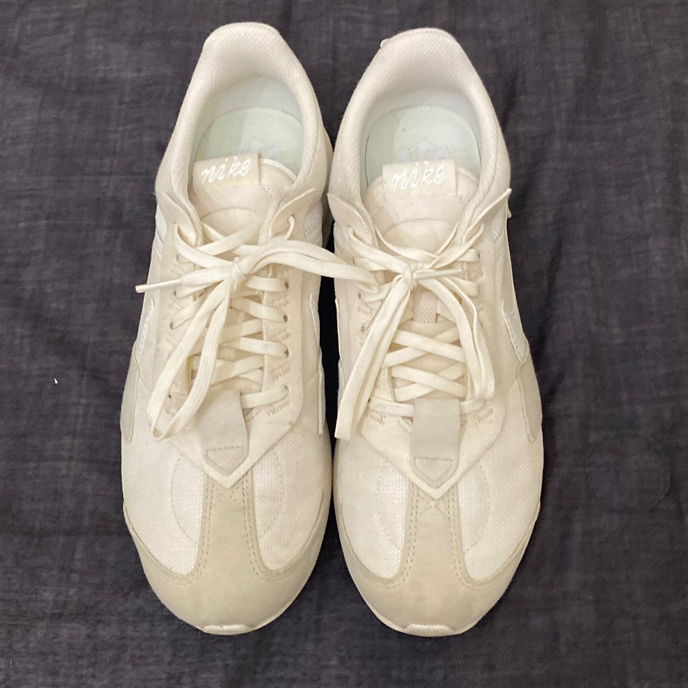 Women white Nike sneakers